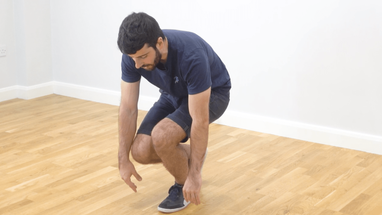 Squatting Split Squat Sagittal min A Powerful Knee Pain Exercise - The Split Squat Sagittal Plane