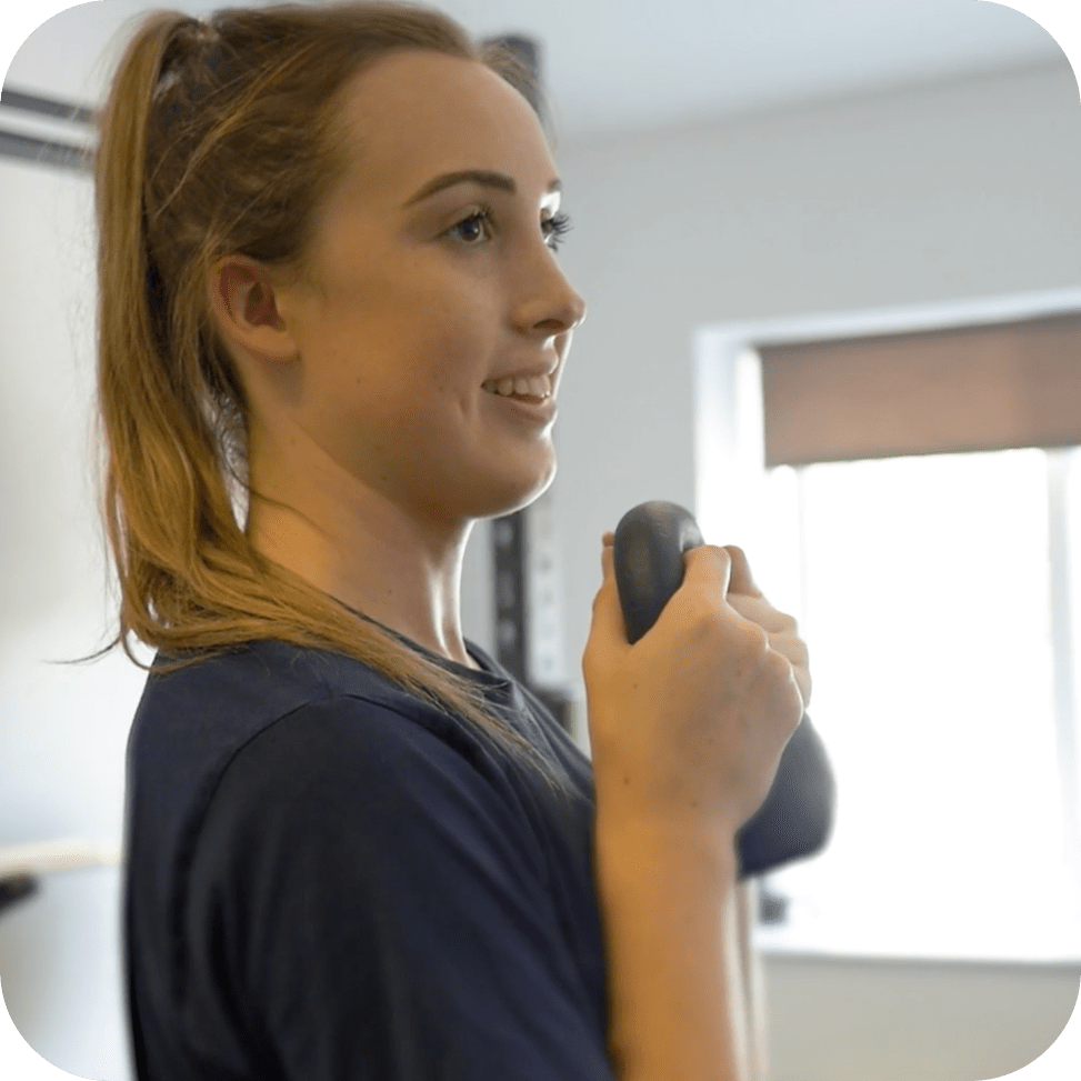 Sarah Holding Weight ProSport Physiotherapy Gym Square Physio Gym
