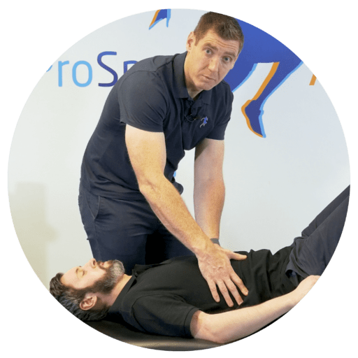 Dave teaching hands on treament for Pain Relief -Physiotherapist in Huddersfield-